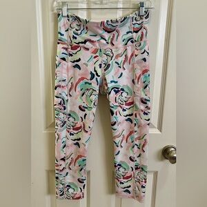 Athleta Ultimate Stash ll capri leggings in floral orchid print in Size-Medium